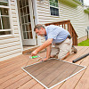 A contractor fixes a screen. Photo by Trigem777/istockphoto.com.