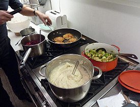 A cook enjoys a professional gas stove. (Photo: Seemann/morguefile.com)