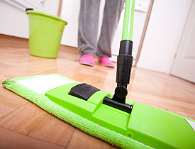 A soft dust mop and a little water are all you need to clean a hardwood floor. (Photo: LukaTDB/istockphoto.com)