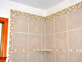 Photo and tile work by KMS Woodworks.