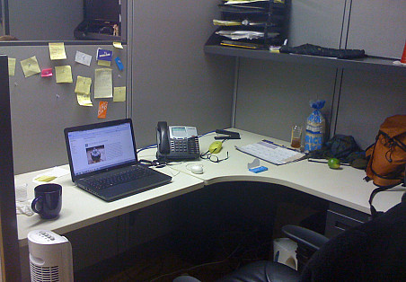 This was my cubicle before the Feng Shui tips from Ann Bingley Gallops. It was kind of a disaster. --Chaya