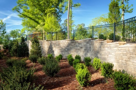 Stone and metal fence / courtesy Belgard