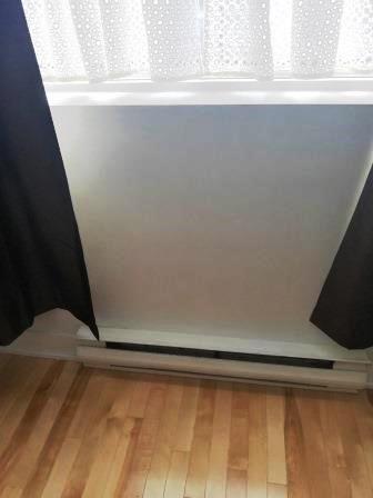 Curtains above baseboard heater / Laura Firszt