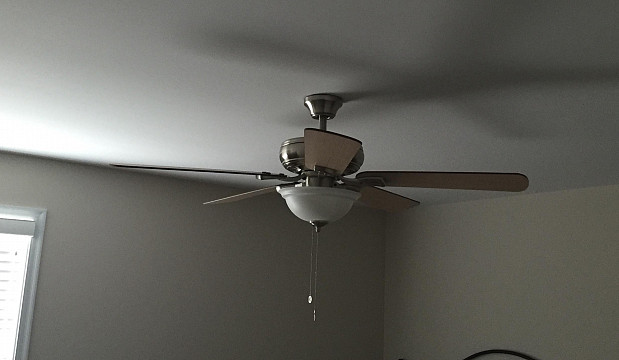 Newly installed ceiling fan with light