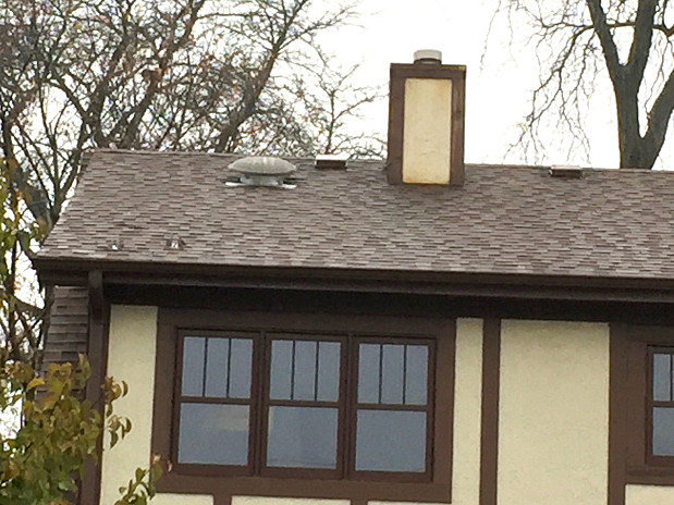 Attic fan installation, seen from roof